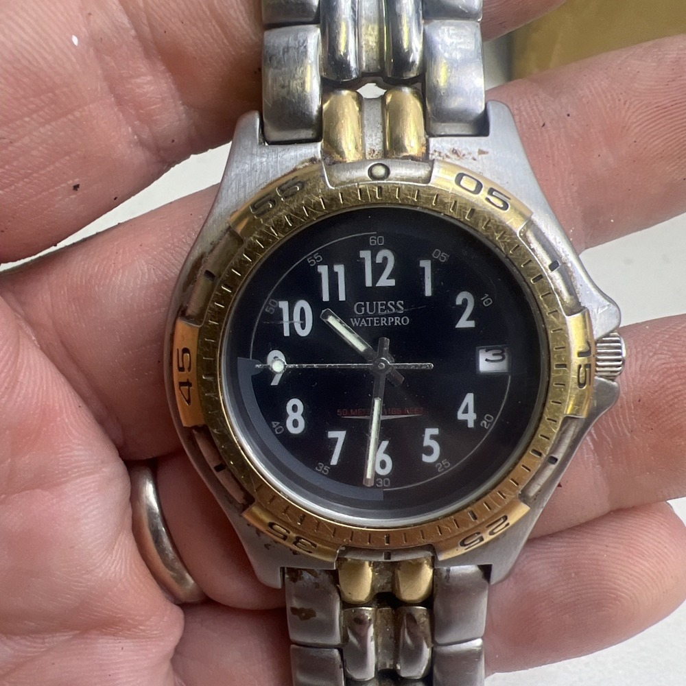 Guess Waterpro Mens Two Tone 100M Quartz Watch Date Bezel needs battery.